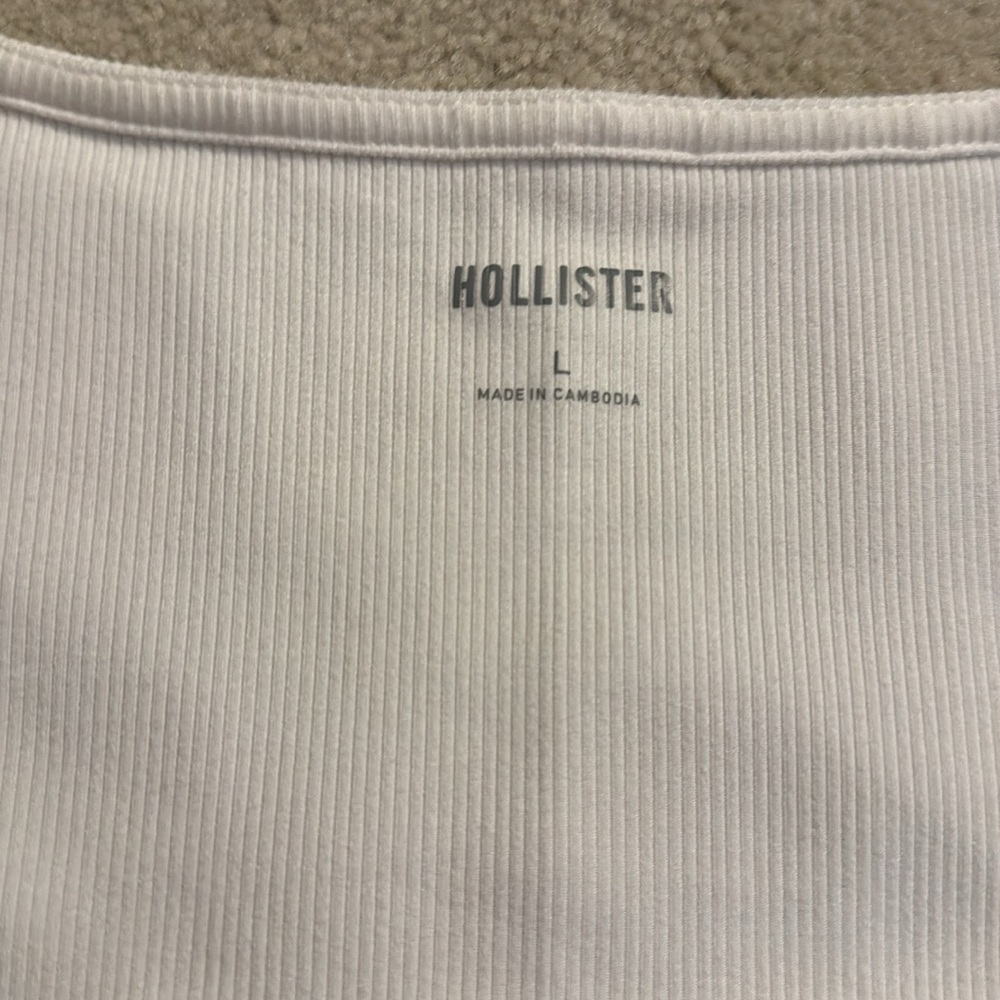 Elegant White Long Sleeve Top with Black Trim - Picture 6 of 6